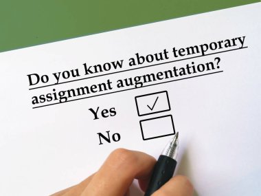 One person is answering question about banking. He knows about temporary assignment augmentation