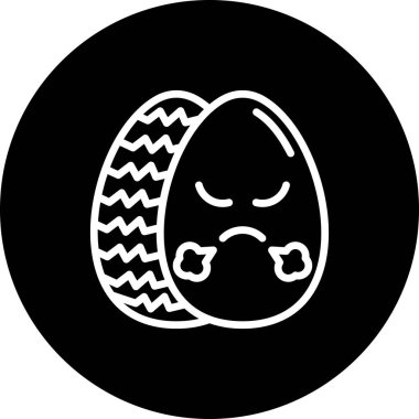 Bir Paskalya yumurtası kızgın bir yüz, çatık kaşlar ve geniş bir kaşla süslenir ve başka bir süslü yumurtanın yanında durur..