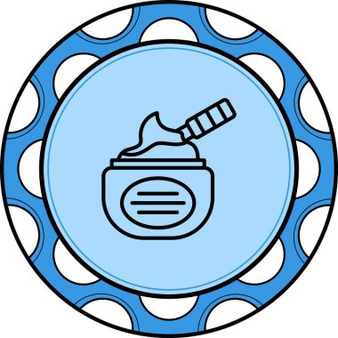 Kremalı ve spatulalı mavi dairesel kap.