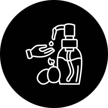 Şişeden el sıvısı dökülüyor.