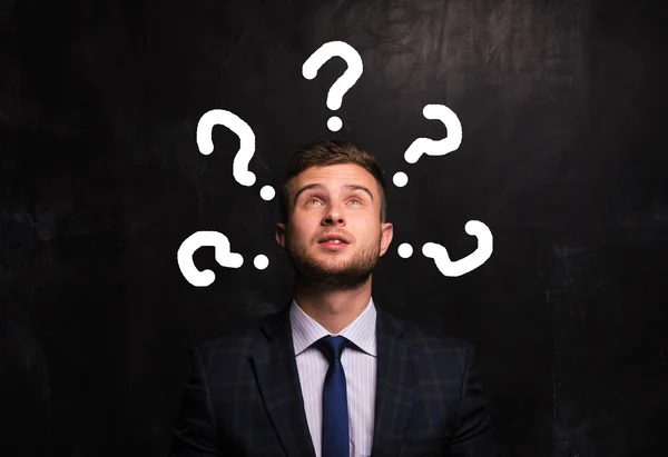 Portrait of thinking man on the background