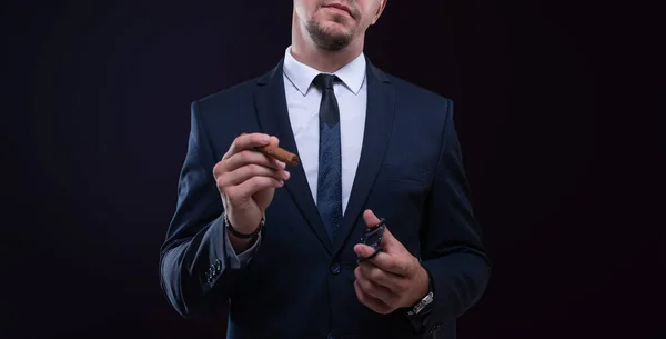 Image of an adult stylish man in a suit with a cigar. Cigar clubs concept. Mixed media