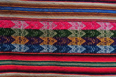 Peru kültürünün geometrik şekilleri ve renkleri ile vikua yününün arka planı