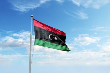 Libya ulusal bayrağı rüzgarda dalgalanıyor.