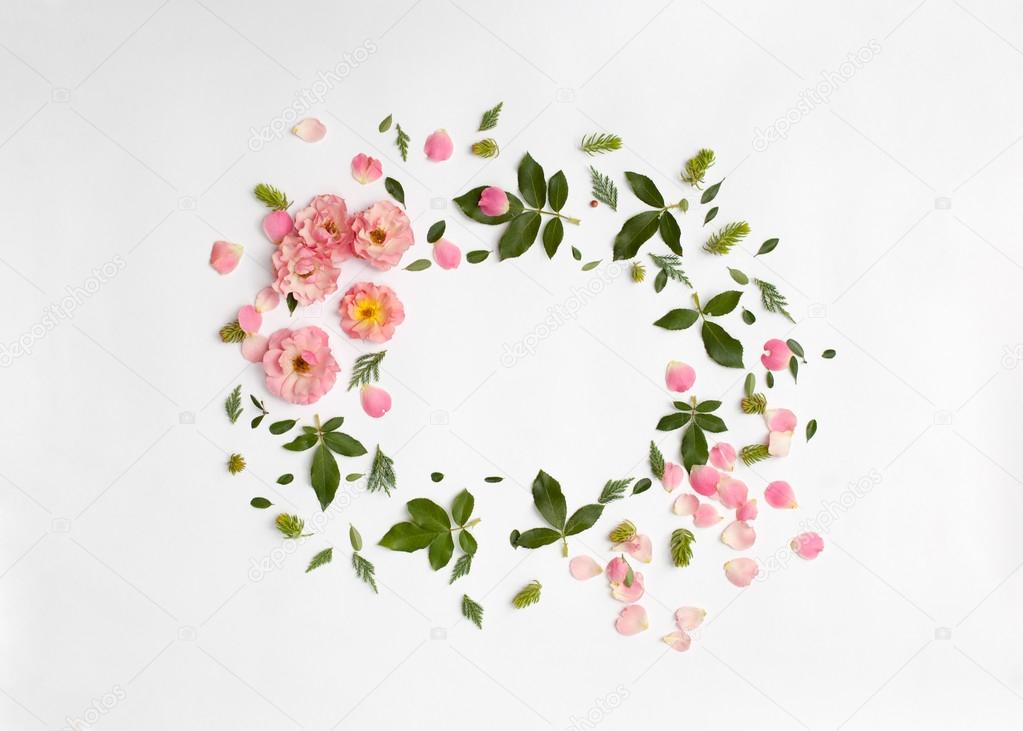 Floral frame with rose flowers, petals, succulent plants 