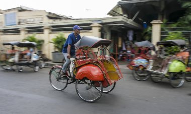 Trishaw or Becak at Yogyakarta town clipart