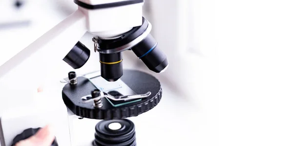 medical laboratory, use of a microscope for chemical biological samples examining liquid, equipment, scientific and medical research, microscopic research, under a microscope, scientific laboratory