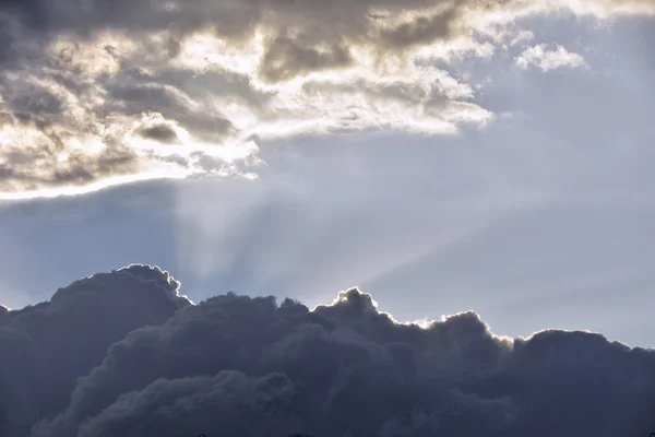 Sun rays through the clouds.