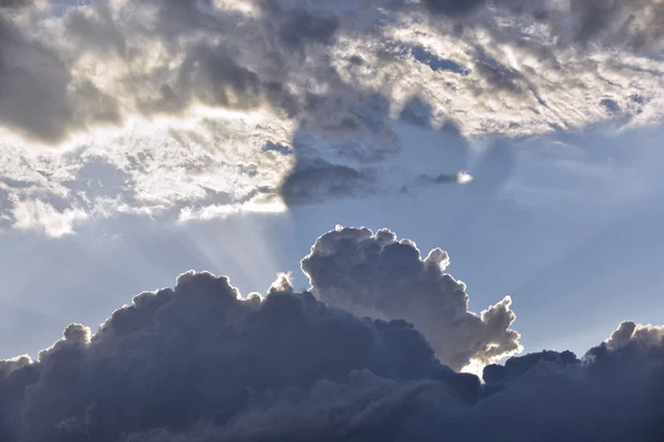 Sun rays through the clouds.