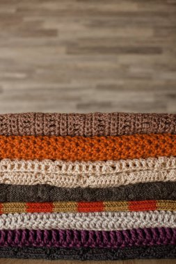 Knitted things. Tangles, knitting needles, and a hook. Background and place for the text.