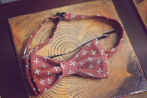 bow tie handmade on a vintage wooden background