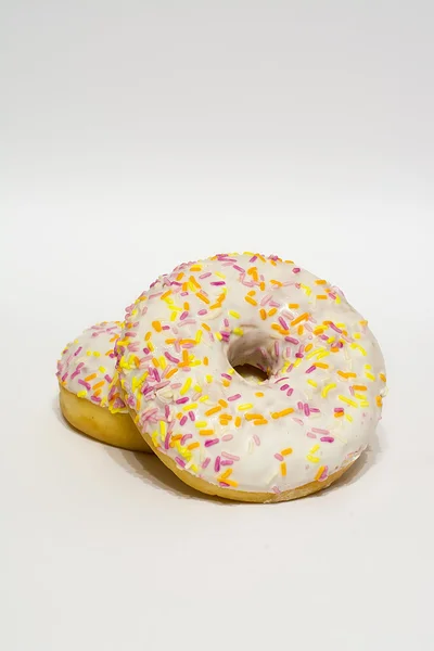 Donuts glasiert auf weißem Hintergrund Stockfoto
