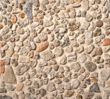 Küçük taşların yüzey dokusu birleşti.