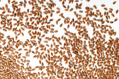 Çiğ Soyulmamış Flax Tohumları Doku Üst Görünümü. Pişmemiş Hulklar Boşluk Kopyalama Kalıbıyla Linseed Deseni