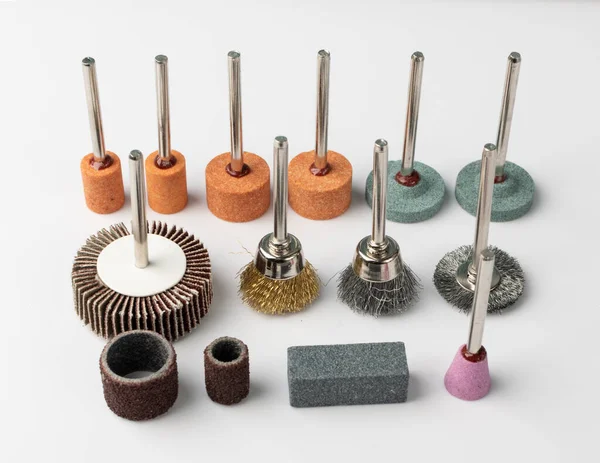 Polishing tools set for sander tool. Mini drill accessories with grinding polishing wheels, abrasive discs, sandpapers, sander tool collection, emery paper, small abrasive equipment — Stock Image Polishing Tools Set Sander Tool Mini Drill Accessories Grinding Polishing Stock Image