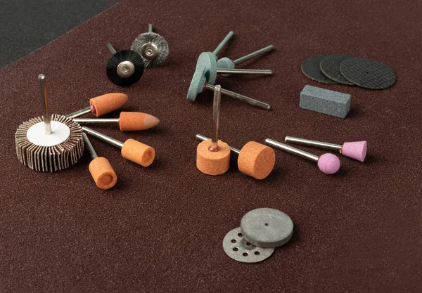Polishing tools set for sander tool. Mini drill accessories with grinding polishing wheels, abrasive discs, sandpapers, sander tool collection, emery paper, small abrasive equipment — Stock Image Polishing Tools Set Sander Tool Mini Drill Accessories Grinding Polishing Stock Photo