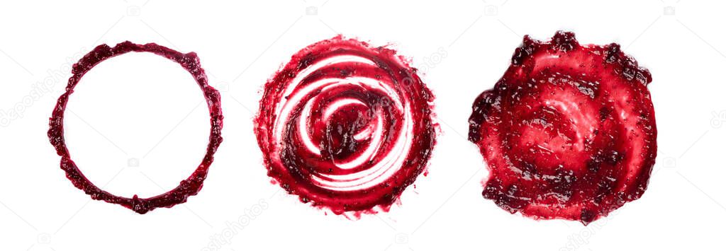 Dark red berry jam round blot frame or spot isolated on white background. Sweet confiture drops or marmalade splash top view
