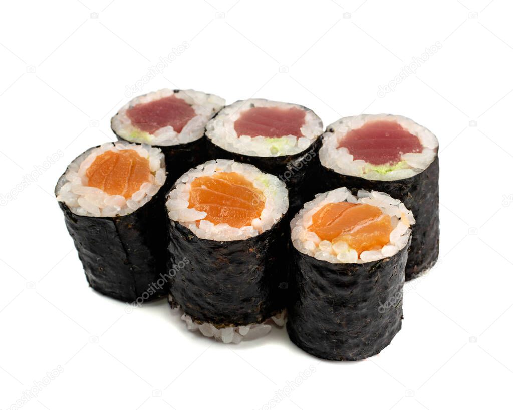 Macro shot of salmon hosomaki sushi isolated on white background with selective focus. Thin maki sushi rolls with raw trout, maguro tuna and nori closeup