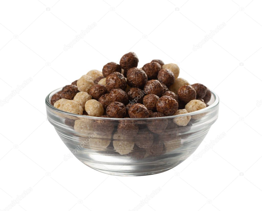 Chocolate vanilla breakfast cereal balls mix in wood bowl isolated. Macro shot of round crunchy corn cereals, dry crispy corn balls or brown and white corn flakes spheres