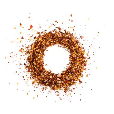 Kırmızı biber tanecikleri model arka plan. Kırılmış kırmızı biber yuvarlak çerçeve, kurutulmuş kırmızı biber taneli duvar kağıdı üst görünümü kopya alanı ile