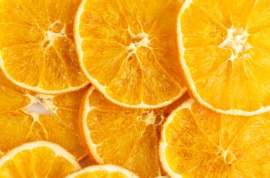 Portakal dokusunun kurumuş dilimleri. Kuru mandalina desenli üst görünüm