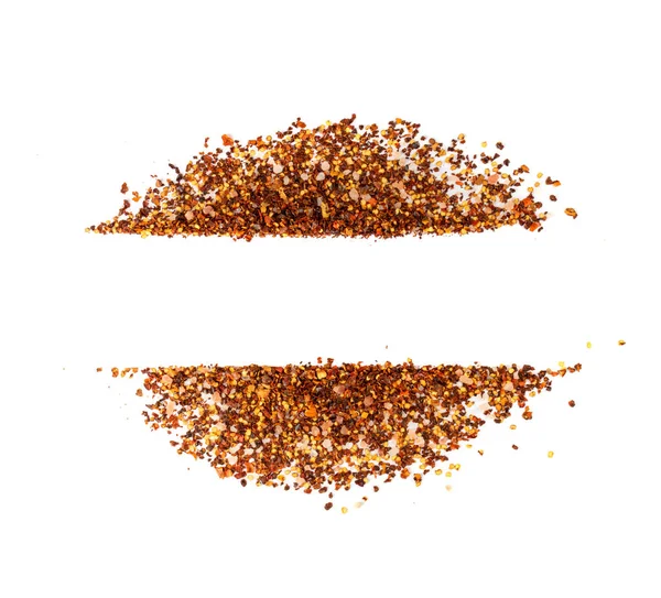 Red chilli pepper flakes mockup background. Broken crushed hot red pepper pattern, dried chili flake wallpaper top view with copy space