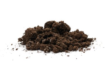 Fertilized dry dirt soil isolated. Dried ground pile, manure soil, arid dirt, natural black dirty earth texture on white background side view clipart