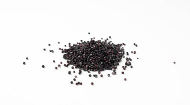 Şeker siyah serpiştirme yığını, yuvarlak şeker serpintileri izole, tatlı renk şekerleme dekorasyonu, beyaz arka planda bir sürü küçük şeker topu