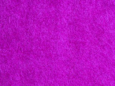 Doğal lifleri ve sıcak toprak tonlarını gösteren Mor kağıt dokusunun yakın çekimi, tasarım, zanaat, ambalaj modellemeleri ve organik veya geri dönüşümlü materyal temaları için ideal bir arka plan..