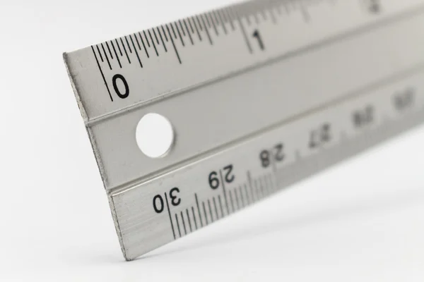 Metal ruler isolated on white — Stock Photo, Image
