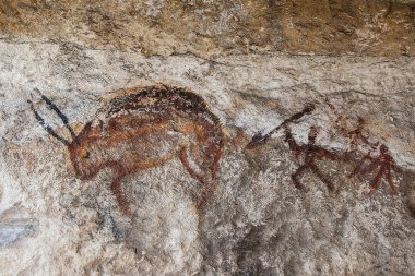 Duvar mağara çizimleri bir ilkel insan ile
