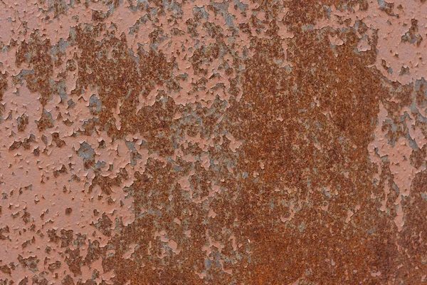Achtergrond. De textuur van de oude roestige metalen plaat met gebarsten verf — Stockfoto