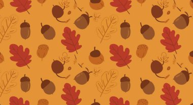 Kahverengi, turuncu ve kırmızı tonlarda tekrar eden meşe palamudu ve meşe yaprakları sıcak, sonbahar estetiği oluşturur..