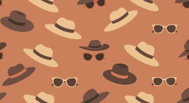 Kahverengi ve bej fötr şapkalı kusursuz desenli, terasotta arka planında şık güneş gözlükleriyle eşleştirilmiş..