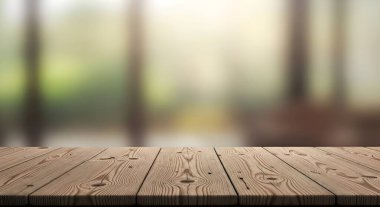 Arkaplanı bulanık tahta masa