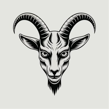 Minimalist stüdyo, dikkat çekici boynuzları olan bir keçi kafası üzerine odaklanıyor.