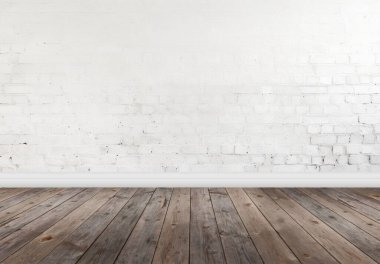Beyaz tuğla bir duvar ve koyu ahşap zemin içeren boş bir stüdyo alanı, tasarım veya ürün fotoğrafçılığı için ideal bir zemin..