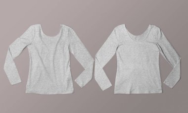 Bir çift uzun kollu beyaz gömlek düz serilmiş ve arka planda yansıtılmış, katalog ve ekommeraziye uygun moda ürünü..