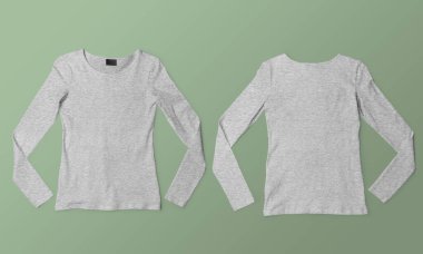 Ürün fotoğrafçılığı ve katalog kullanımı için yeşil zemine serilmiş iki düz beyaz gömlek.