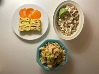 Warm and comforting jibbap (home-cooked Korean meal) with a spread of rice, soup, and banchan, offering a perfect harmony of flavor, tradition, and heartwarming nourishment in every bite.