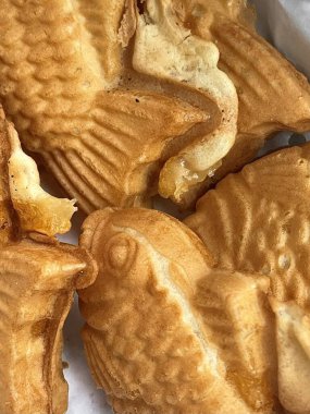 Bungeoppang, bungeo-ppang (Kore Balık Şekilli Pasta), popüler aperatif, kurabiye, Kore 'nin kışlık sokaklarında tatlı. Bungeoppang Kore geleneksel yemek, yemek, mutfak. Japon Taiyaki.