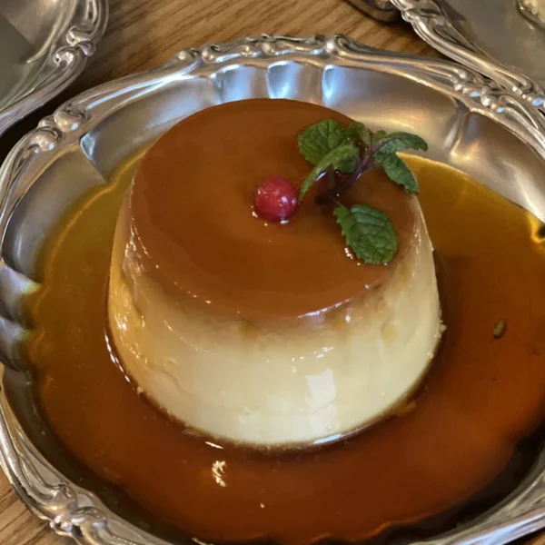 Smooth and creamy pudding with a velvety texture, offering a sweet and satisfying flavor. Perfect as a simple dessert or a refreshing treat for any occasion.
