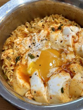 Delicious bowl of ramyeon with flavorful broth, tender noodles, and savory toppings. A comforting and satisfying Korean dish, perfect for a quick meal or cozy night in. Spicy, hearty, and delicious!