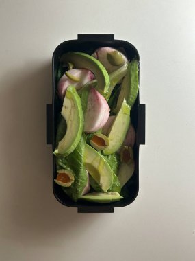 Bento or dosirak box filled with rice, assorted side dishes, vegetables, and protein like meat or fish, all neatly arranged to create a balanced, colorful, and visually appealing meal