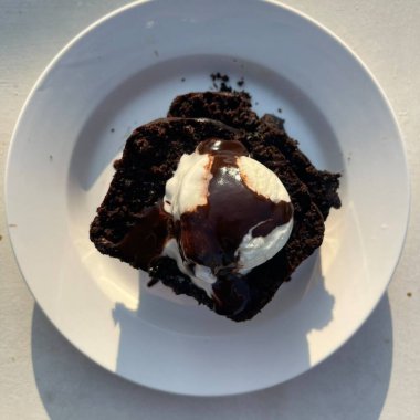 Rich, moist chocolate cake with a decadent, velvety texture and deep chocolate flavor. A perfect indulgence for dessert lovers, offering a satisfyingly sweet treat in every bite.