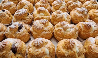 Light and airy choux pastry with a golden crust, filled with rich cream or custard. This elegant and versatile dessert offers a perfect balance of texture and sweetness.
