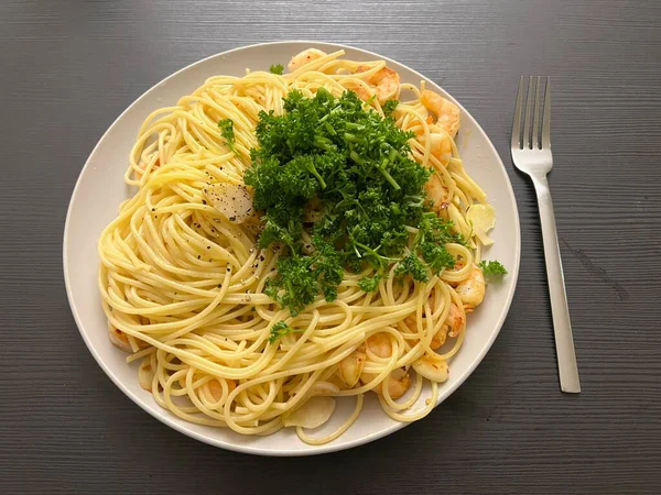 Creamy spaghetti carbonara made with rich egg yolk sauce, crispy bacon, parmesan cheese, and freshly ground black pepper for a classic, indulgent Italian pasta dish.