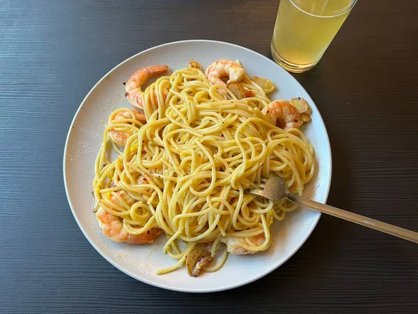Creamy spaghetti carbonara made with rich egg yolk sauce, crispy bacon, parmesan cheese, and freshly ground black pepper for a classic, indulgent Italian pasta dish.