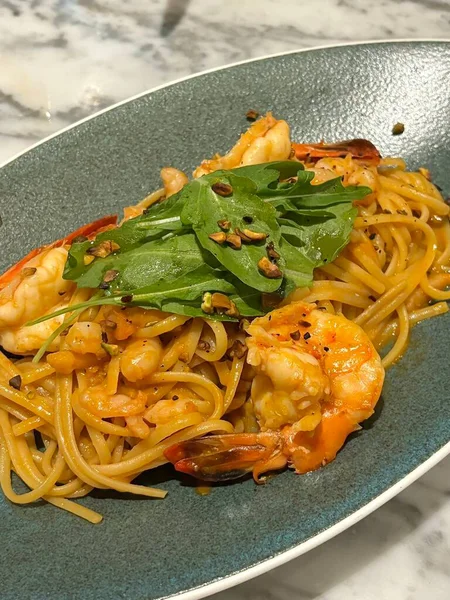 Creamy spaghetti carbonara made with rich egg yolk sauce, crispy bacon, parmesan cheese, and freshly ground black pepper for a classic, indulgent Italian pasta dish.