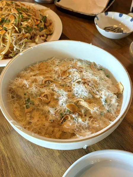 Creamy spaghetti carbonara made with rich egg yolk sauce, crispy bacon, parmesan cheese, and freshly ground black pepper for a classic, indulgent Italian pasta dish.